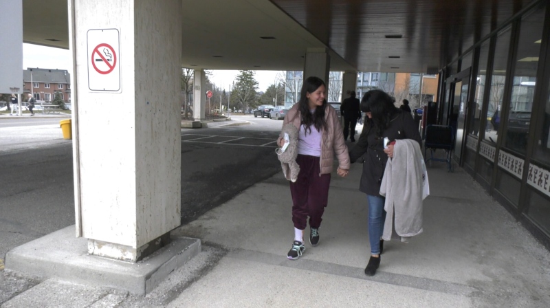 Serene Summers, 13, walks out of CHEO for the first time in six weeks. She was the victim of a hit-and-run on Meadowlands Drive on February 13. (Leah Larocque/CTV News Ottawa)