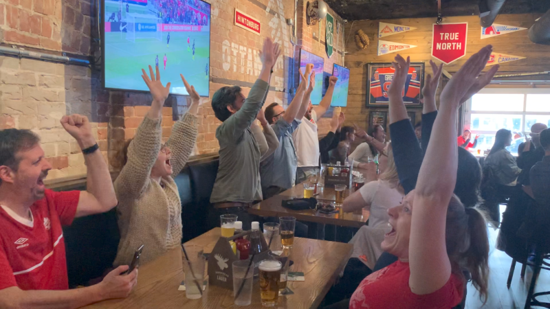 Soccer fans celebrate at the Senate Tavern as Canada beats Jamaica 4-0 to secure a birth in the World Cup. (Jackie Perez/CTV News Ottawa)