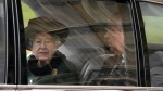 Queen Elizabeth II and her son Prince Andrew are driven after attending a Service of Thanksgiving for the life of Prince Philip, Duke of Edinburgh at Westminster Abbey in London, on March 29, 2022. (Frank Augstein / AP) 