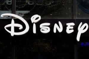 This photo taken Sept. 20, 2017, shows the logo of theme parks "Disney" Store on the Champs Elysees Avenue in Paris, France. (AP Photo/Francois Mori)