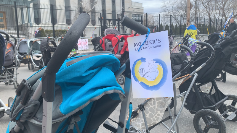 Dozens of strollers line the street outside the Russian embassy in Ottawa, representing children killed during the Russian invasion. (Jackie Perez/CTV News Ottawa)