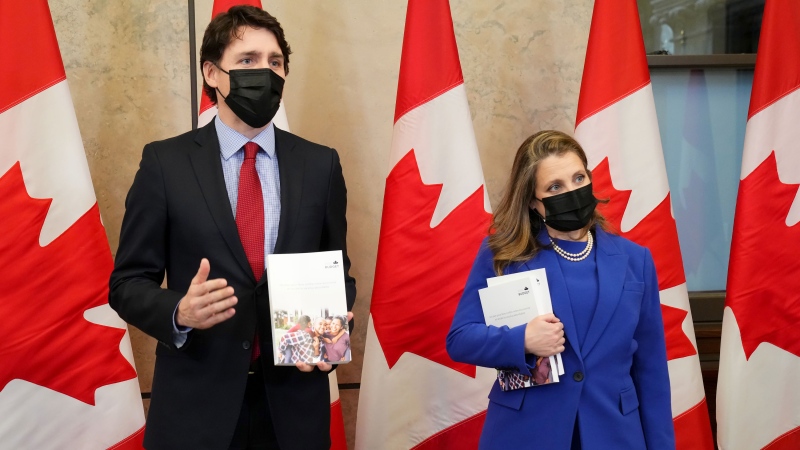 Finance Minister and Deputy Prime Minister Chrystia Freeland and Prime Minister Justin Trudeau speak with members of the media before the release of the federal budget, on Parliament Hill, in Ottawa, Thursday, April 7, 2022. THE CANADIAN PRESS/Sean Kilpatrick