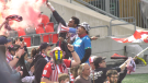 Eddie Benhin leading the supporter section during the Atletico Ottawa home opener at TD Place. (Jackie Perez/CTV News Ottawa)