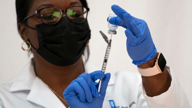 In this file photo, the director of employee health services at Northwell Health prepares the Moderna COVID-19 vaccine. (Eduardo Munoz/Pool Photo via AP, File) 