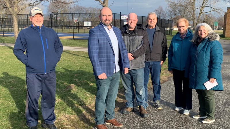 Community activist Greg Lemay and residents gather in Forest Glade in Windsor, Ont., on Monday, April 11, 2022. (Bob Bellacicco / CTV Windsor)