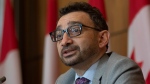 Minister of Transport Omar Alghabra speaks during a news conference, Tuesday, Feb. 15, 2022 in Ottawa. THE CANADIAN PRESS/Adrian Wyld