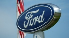 A Ford logo is seen on signage at Country Ford in Graham, N.C., on July 27, 2021. (Gerry Broome / AP)