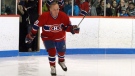 Guy Lafleur skates onto the ice to play his last game of old timers hockey in his hometown of Thurso, Quebec, Sunday December 12, 2010. THE CANADIAN PRESS/Fred Chartrand