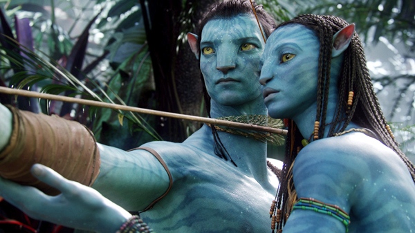 The character Neytiri, voiced by Zoe Saldana, right, and the character Jake, voiced by Sam Worthington are shown in a scene from 20th Century Fox's 'Avatar.' 