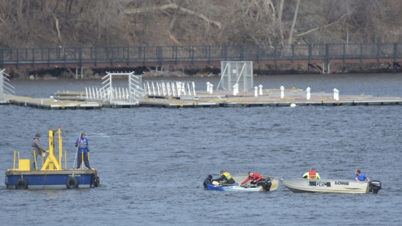 Members of the Ottawa Rowing Club helped the Ottawa Fire Service rescue a kayaker in distress on the Ottawa River near the Alexandra Bridge Sunday, April 24, 2022. (Ottawa Fire Service/Twitter)