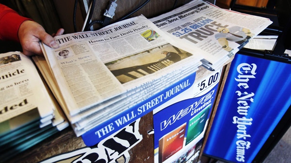 A newspaper rack is shown in Palo Alto, Calif. on Nov. 13, 2009. (AP / Paul Sakuma)