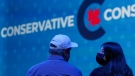 Conservative supporters watch at then-Conservative leader Erin O'Toole's election headquarters as a Liberal government win is declared during the Canadian federal election, in Oshawa, Ont., Sept. 20, 2021. THE CANADIAN PRESS/Nathan Denette