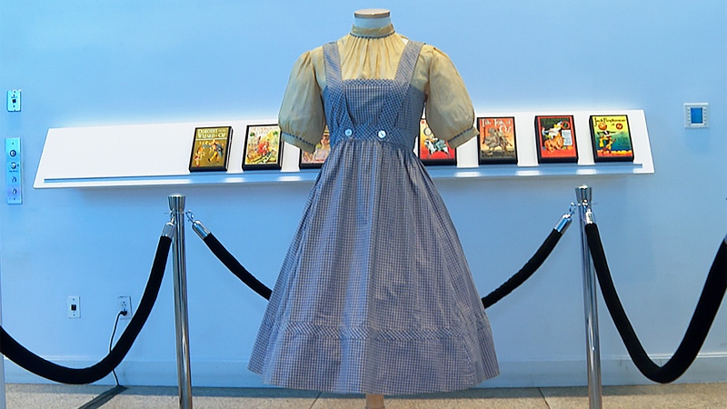 Judy Garland's dress from the 'Wizard of Oz,' hangs on display, Monday, April 25, 2022, at Bonhams in New York. (AP Photo/Katie Vasquez)