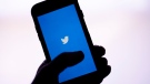 The Twitter application is seen on a digital device Monday, April 25, 2022, in San Diego. (AP Photo/Gregory Bull)