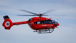 A STARS air ambulance crew arrives at their base in Calgary, Alta., Friday, March 25, 2022.THE CANADIAN PRESS/Jeff McIntosh