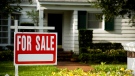 For Sale sign seen outside home. (Shutterstock)