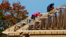 Carpenters work on new home in a newly constructed subdivision in Ottawa on Wednesday, Oct. 20, 2021. (Sean Kilpatrick/THE CANADIAN PRESS)