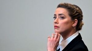 Actor Amber Heard listens in the courtroom at the Fairfax County Circuit Court in Fairfax, Va., Tuesday May 3, 2022. (Jim Watson/Pool photo via AP)