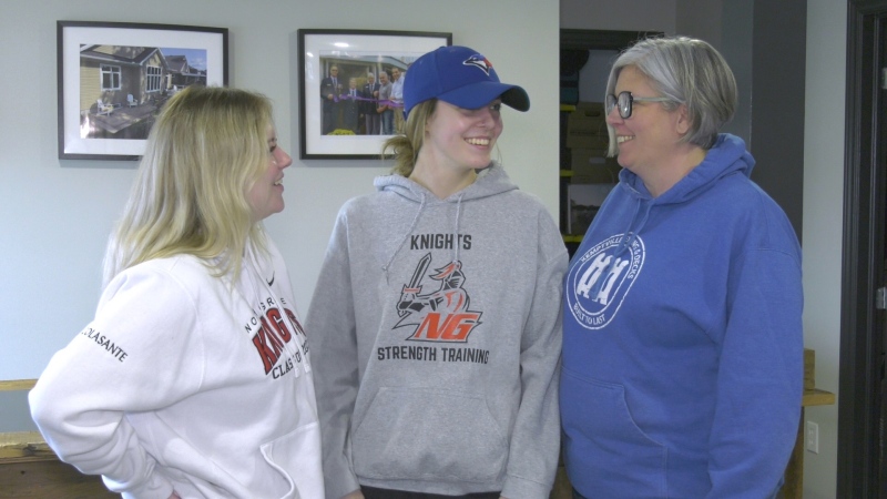Emma Colasante (left), Abi Ansell (centre) and Abi's mother Michelle discuss their prom fundraising campaign for North Grenville District High School (Nate Vandermeer/CTV News Ottawa)