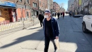 A man walks through Montreal's Gay Village as the province prepares to lift its mask mandate during the COVID-19 pandemic. (Daniel J. Rowe/CTV News)