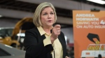NDP Leader Andrea Horwath answers questions from the media, after announcing their plan to lower auto insurance rates by 40 per cent if elected, during a campaign stop in Brampton, Ont., Wednesday, May 11, 2022. THE CANADIAN PRESS/ Tijana Martin