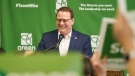 Ontario Green Party leader Mike Schreiner speaks to candidates at a campaign event in Kitchener, Ont. on Sunday, April 10, 2022. THE CANADIAN PRESS/Geoff Robins