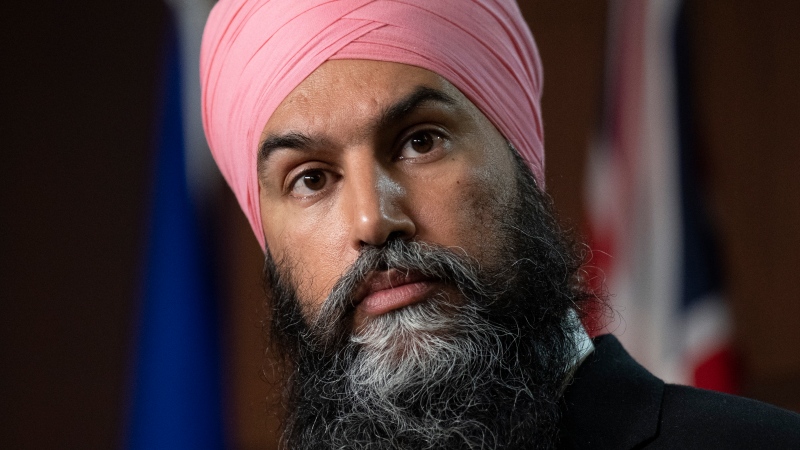 New Democratic Party leader Jagmeet Singh listens to a question as he speaks with the media following caucus, Wednesday, May 4, 2022 in Ottawa. THE CANADIAN PRESS/Adrian Wyld