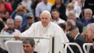 Pope Francis arrives on the popemobile to attend his weekly open-air general audience in St. Peter's Square at The Vatican, May 4, 2022. (AP Photo/Andrew Medichini)