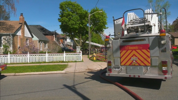 Crews are on the scene of a house fire in Rexdale on Saturday, May 14, 2022.