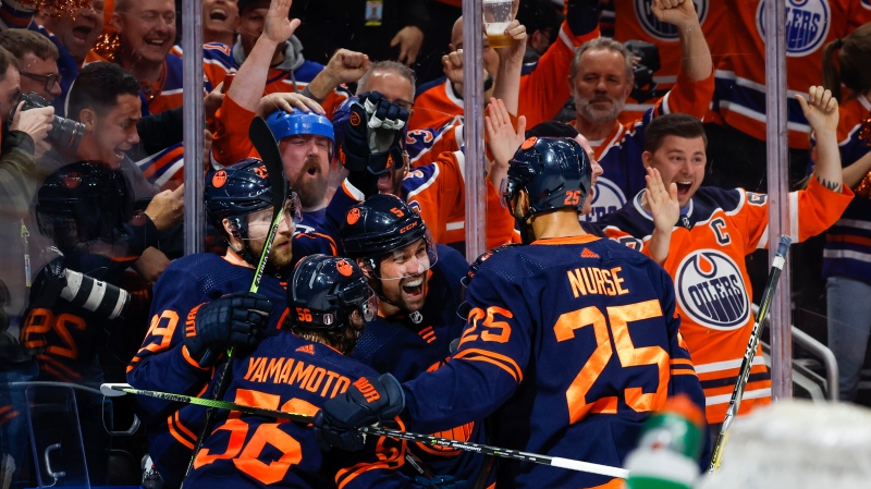 Edmonton Oilers defenceman Cody Ceci, centre, celebrates his goal with teammates during second period NHL playoff hockey action against the Los Angeles Kings in Edmonton, Saturday, May 14, 2022 (The Canadian Press/Jeff McIntosh).