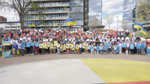 Around 200 people gather at Saksatoon's River Landing for the Stand With Ukraine rally on Sunday, May 15 (Tyler Barrow/CTV News)