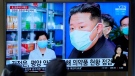 People watch a TV screen showing a news program reporting with an image of North Korean leader Kim Jong Un at a train station in Seoul, South Korea on May 16, 2022. Kim blasted officials over slow medicine deliveries and ordered his military to respond to the surging but largely undiagnosed COVID-19 crisis that has left 1.2 million people ill with fever and 50 dead in a matter of days, state media said Monday. (AP Photo/Lee Jin-man)