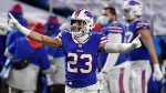 In this Jan. 16, 2021, file photo, Buffalo Bills' Micah Hyde (23) celebrates with teammates after an NFL divisional round football game against the Baltimore Ravens in Orchard Park, N.Y. AP Photo/Adrian Kraus, File)