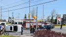 A vehicle rests on its side after a collision in Barrie, Ont., on Bayfield Street on Sun., May 15, 2022 (Photo Courtesy: Michael Chorney)