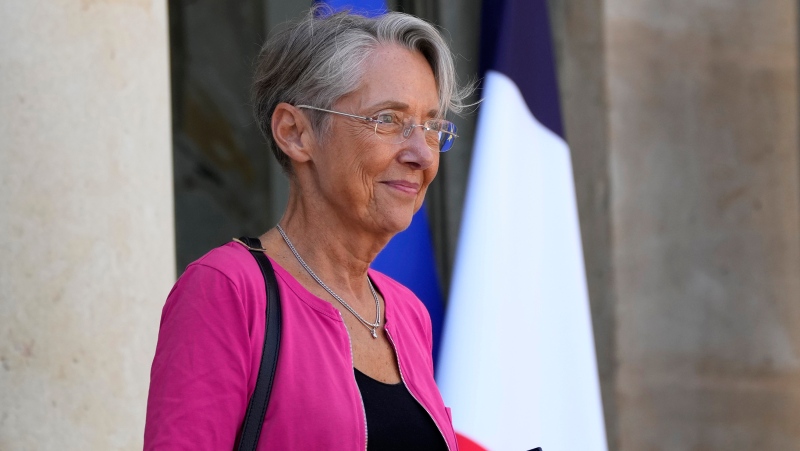 Elisabeth Borne leaves after the weekly cabinet meeting, at the Elysee Palace, in Paris, Wednesday, May 11, 2022. (AP Photo/Francois Mori, File)