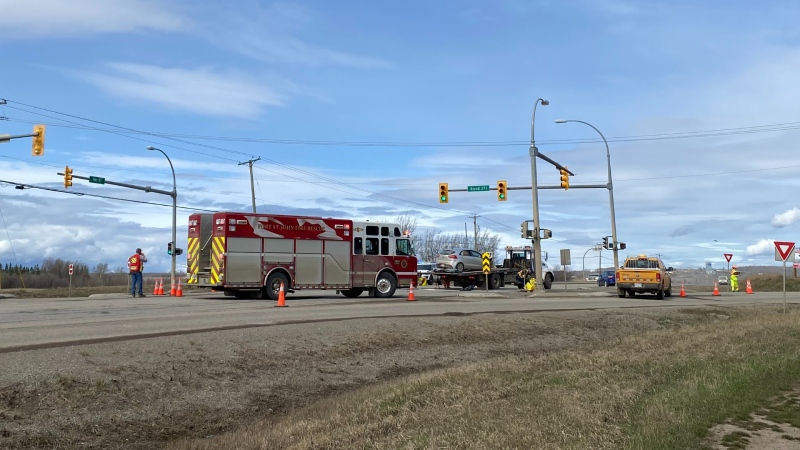 Emergency officials attending the scene of a two vehicle collision at Highway 97 and 271 Road near Fort St. John 