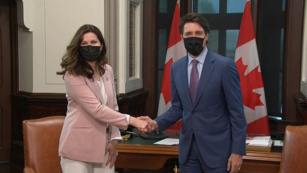 Regina Mayor Sandra Masters shakes hands with Prime Minister Justin Trudeau in Ottawa on May 16, 2022. 