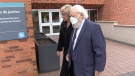 Paul Sadlon, 89, walks into the Barrie Courthouse with his lawyer Karen Jokinen on Mon., May 16, 2022. (Mike Arsalides/CTV News)
