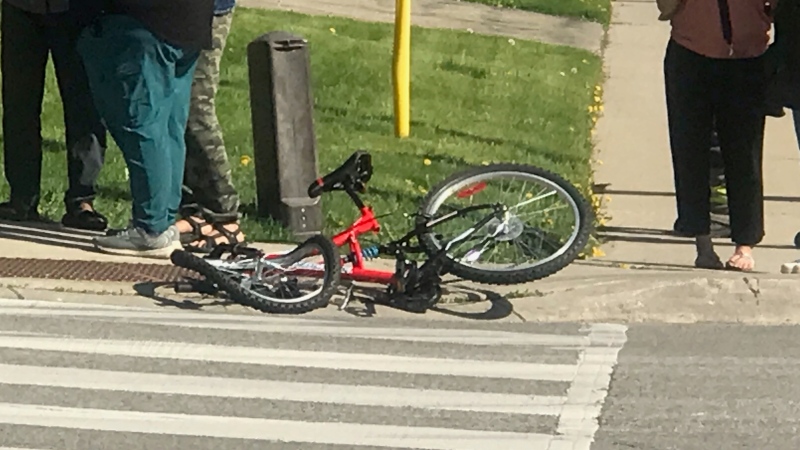A bicycle on the ground at the scene of crash on Westmount Rd. in Kitchener. (May 16, 2022)