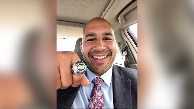 Eddie Steele poses with his recovered Grey Cup ring.