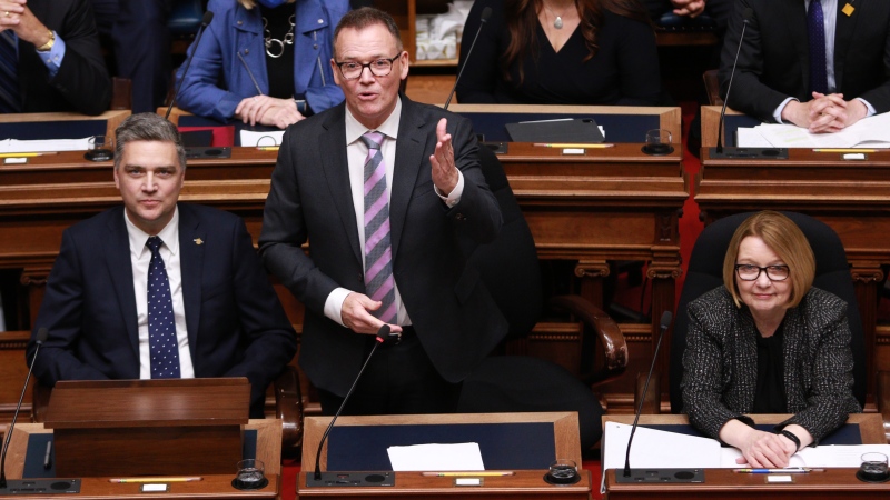 Liberal House Leader Todd Stone, left, and former Opposition Liberal Leader Shirley Bond, right, look on as new Opposition B.C. Liberal Party Leader Kevin Falcon gives a speech the legislative assembly at legislature in Victoria, Monday, May 16, 2022. THE CANADIAN PRESS/Chad Hipolito