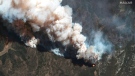 This satellite image provided by Maxar Technologies shows the active fire lines of the Hermits Peak wildfire, in Las Vegas, New Mexico, on Wednesday, May 11, 2022 (Satellite image 2022 Maxar Technologies via AP)