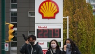 A sign at a gas station displays the price of a litre of regular grade gasoline after it reached a new high of $2.28 in Vancouver on May 14, 2022. THE CANADIAN PRESS/Darryl Dyck