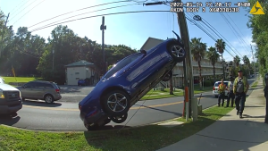 Police in Tallahassee, Florida made a DUI arrest after finding a Mustang crashed vertically into a power pole.