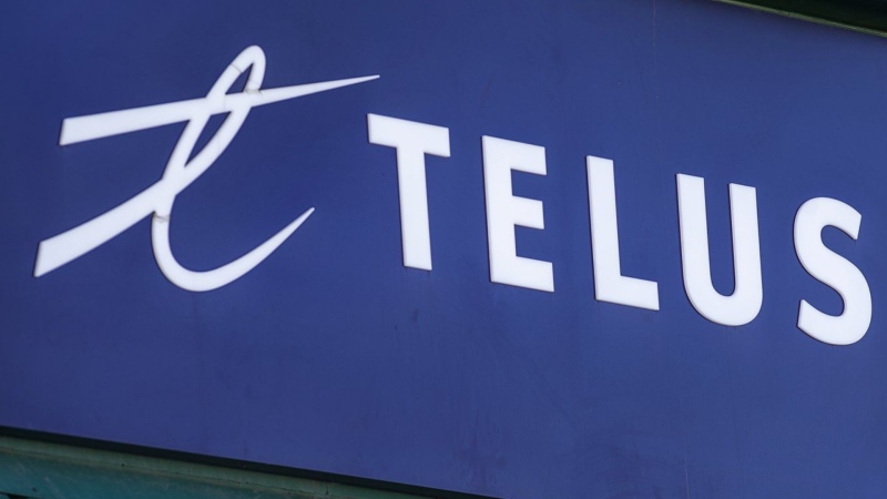 A Telus sign is seen on a storefront in Halifax on Thursday, Feb. 11, 2021. Telus Corp. says it will invest $17.5 billion in British Columbia and $17 billion in Alberta and create thousands of new jobs in these provinces over the next four years as it looks to expand its wireless networks. Andrew Vaughan/The Canadian Press