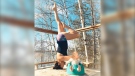 Erica Whitman and her baby do yoga outside. (Erica Whitman/Instagram)