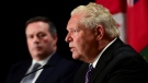 Ontario Premier Doug Ford speaks as Alberta Premier Jason Kenney looks on during a press conference in Ottawa on Friday, Sept. 18, 2020. THE CANADIAN PRESS/Sean Kilpatrick