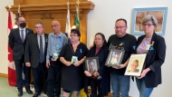 Families who have lost loved ones to suicide met with the NDP at the Saskatchewan Legislative Building to call on the government for more suicide prevention supports. (Gareth Dillistone/CTV News)