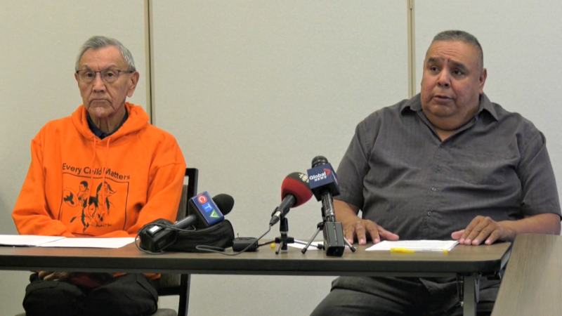 Eric Large and Jason Whiskeyjack speak to reporters in Edmonton on May 17, 2022 (CTV News Edmonton).
