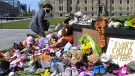 Prime Minister Justin Trudeau visits a memorial at the Cantennial Flame on Parliament Hill in Ottawa on June 1, 2021, in recognition of discovery of unmarked graves at the site of a former residential school in Kamloops, B.C. THE CANADIAN PRESS/Sean Kilpatrick